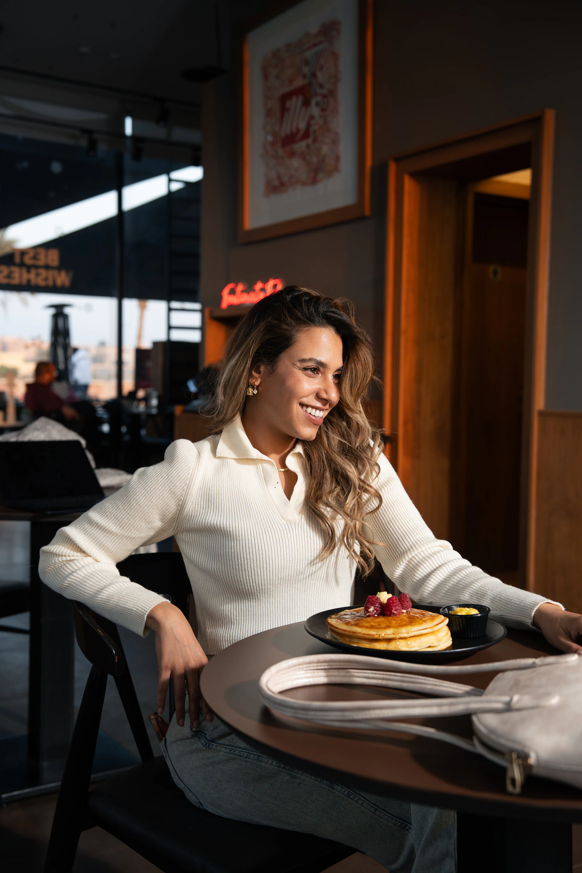 illy Winter 2025 lifestyle campaign portrait in a café