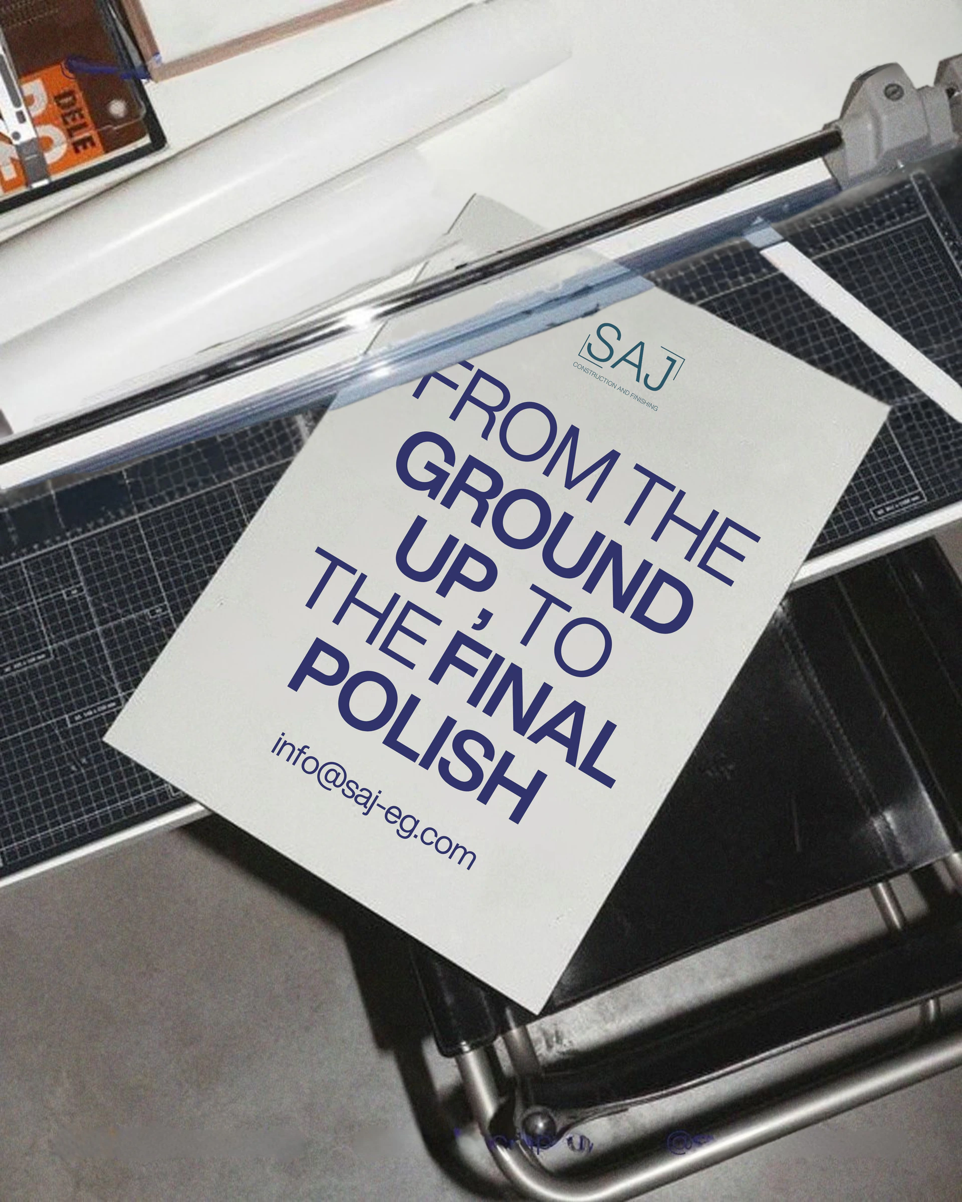 SAJ printed brand card with the message From the ground up to the final polish